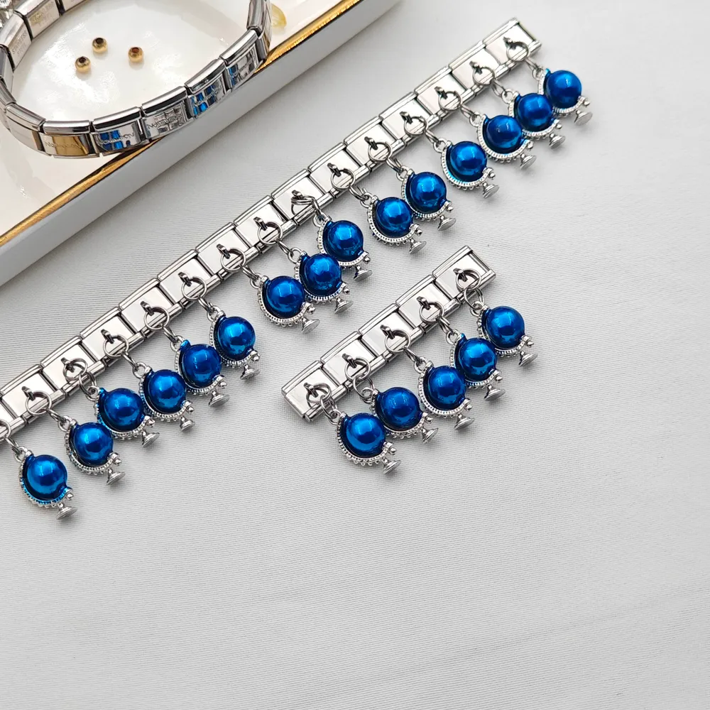 Stainless Steel Nomi Charm Gezegen